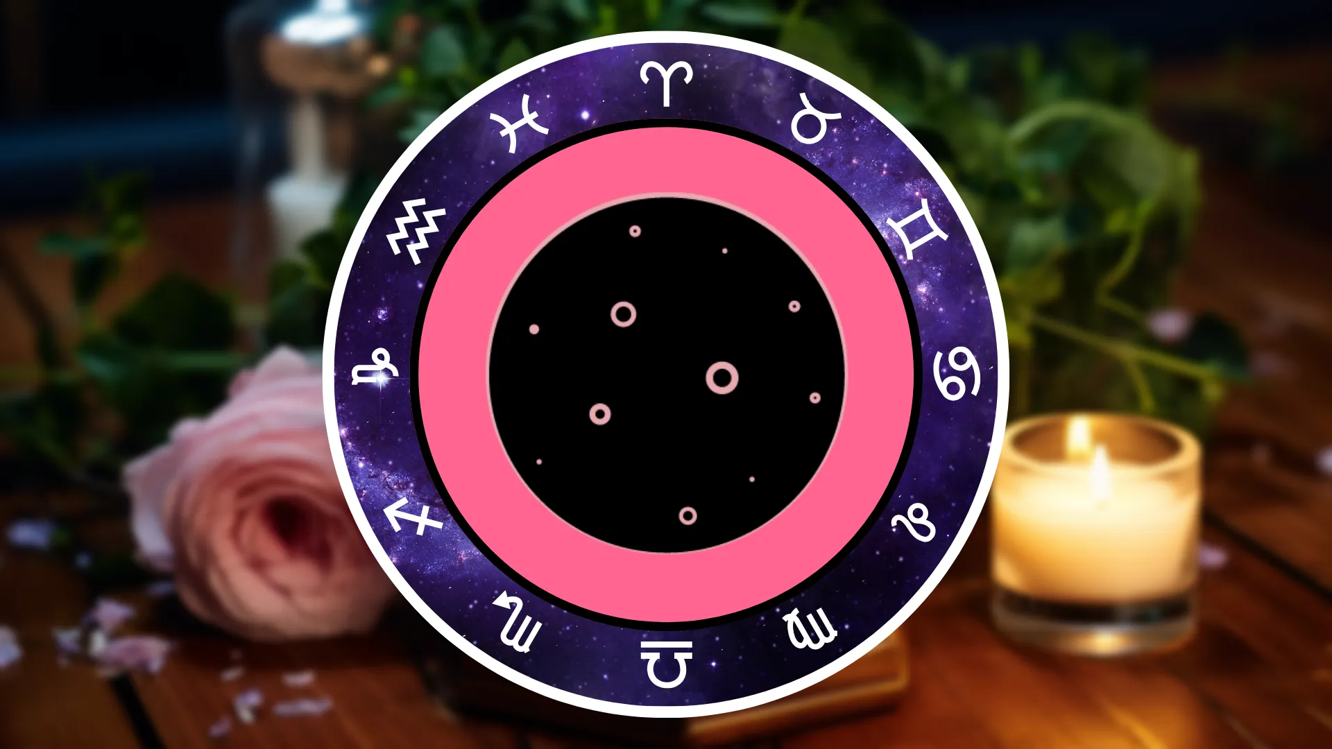 A symbol of a New Moon is surrounded by the Zodiac signs on a table with flowers and candles