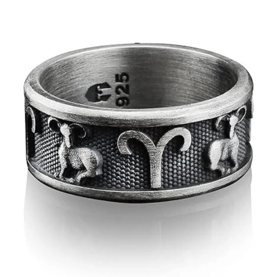 A silver Aries zodiac ring featuring detailed ram designs, crafted for bold and expressive Aries men to proudly display their astrological sign as a cherished gift.