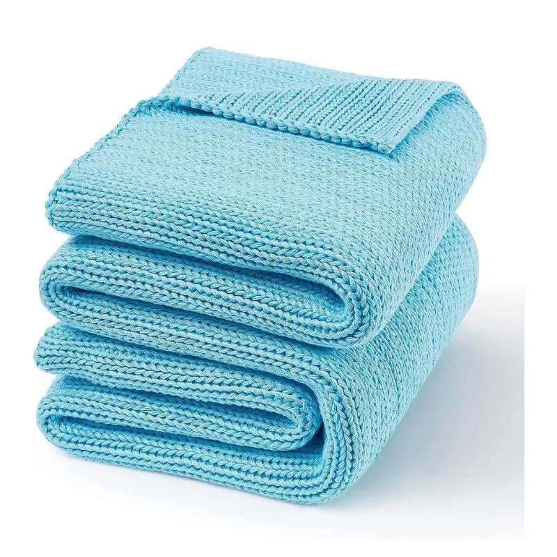 Soft, knitted weighted blanket in light blue, designed to provide comfort and relaxation. The Weighted Blanket is perfect for grounding and calming Pisces.