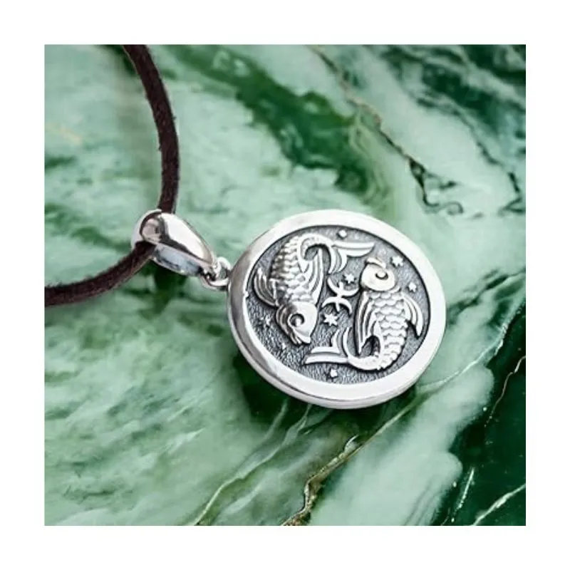 Elegant Pisces Horoscope Necklace featuring a sterling silver pendant with intricate zodiac detailing. A meaningful gift for Pisces to keep their sign close to heart.