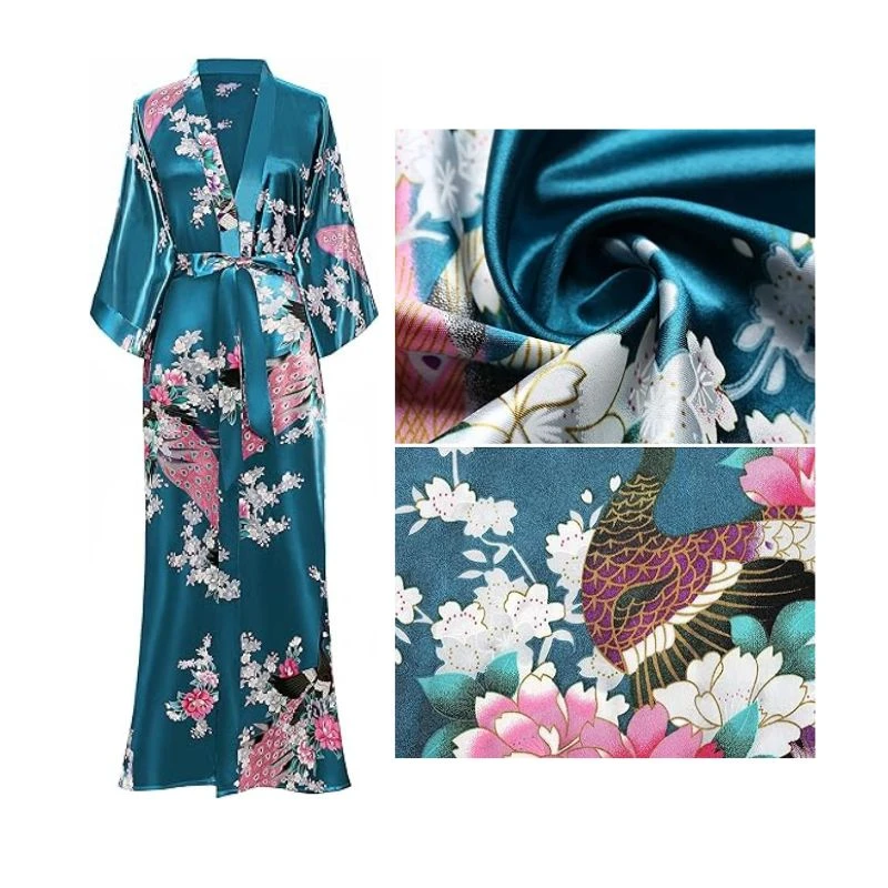 Image of a teal silk kimono robe with floral and peacock designs, shown with a close-up of the fabric, on a white background